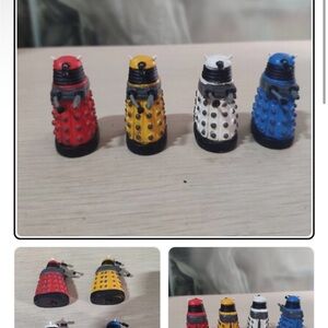 Collectible Sci‑Fi Mini Figure Set — Red, Yellow, White & Blue